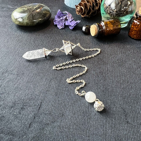 Dowsing quartz pendulum for divination