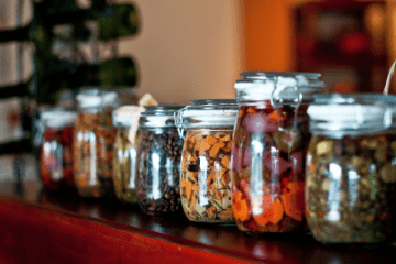 jars_of_pickled_food_in_a_line