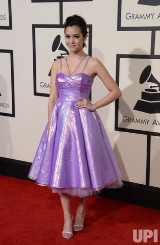 Megan Nicole at the Grammys in a purple shiny party dress by Julie Mollo iridescent red carpet