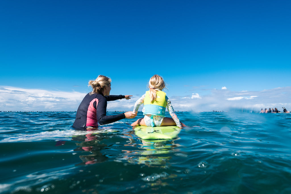 MUM AND DAUGHTER AT PEP-11 PADDLE OUT