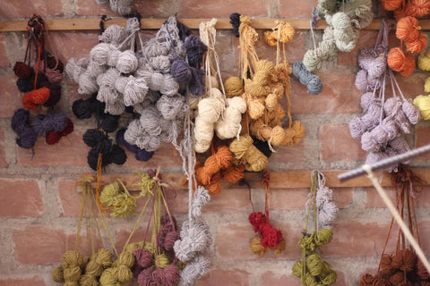 Hand-dyed wool hanging to dry.