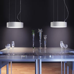 Cyclos pendant by Zaneen in a dining room