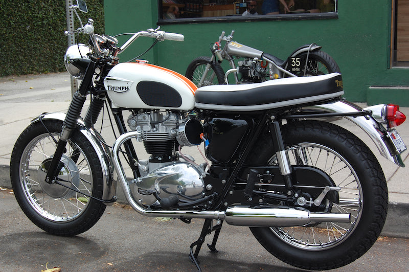 1966 Bonneville in front of shop