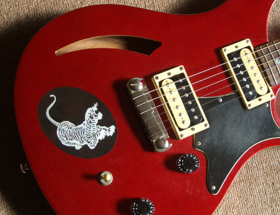 Grateful Dead News: Jerry's Tiger Guitar in the Sports Page