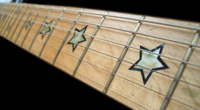 star fretboard inlays