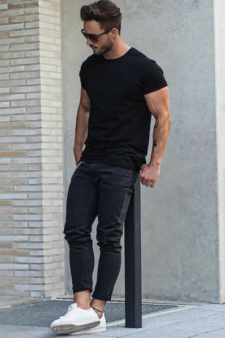 man in black outfit