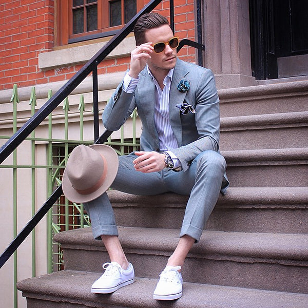white sneakers grey suit
