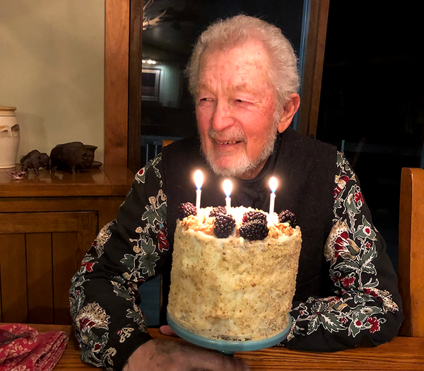 Gervase HIttle with a birthday cake