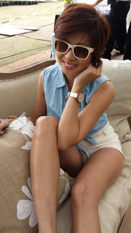 girl wearing white sunglasses and watch