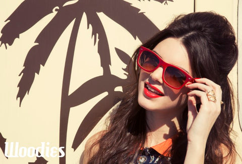 girl in red lipstick wearing red wayfarer sunglasses