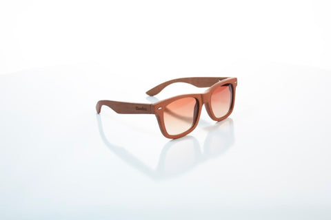 brown wooden sunglasses with the brand woodies in the shade of brown