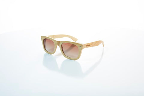 wooden sunglasses with the brand woodies in the shade of brown 