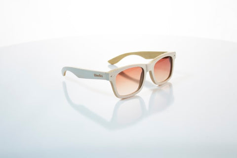 white wooden sunglasses with the brand woodies in the shade of brown