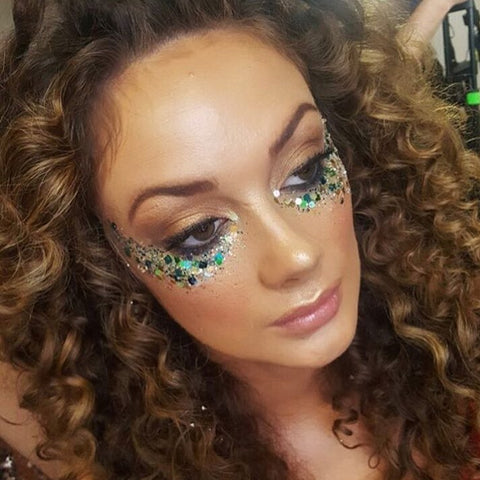 Woman with glitter makeup under the eyes