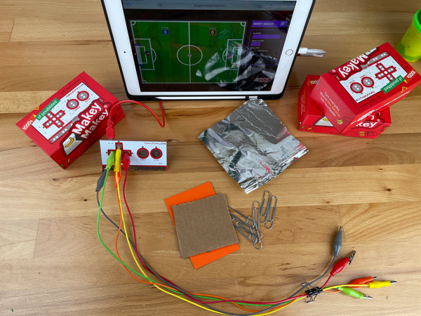 Materials for Scrappy joystick: cardboar, cardstock, foil, paper clips