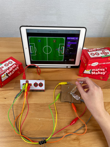 full scrappy joystick playing soccer app on tablet