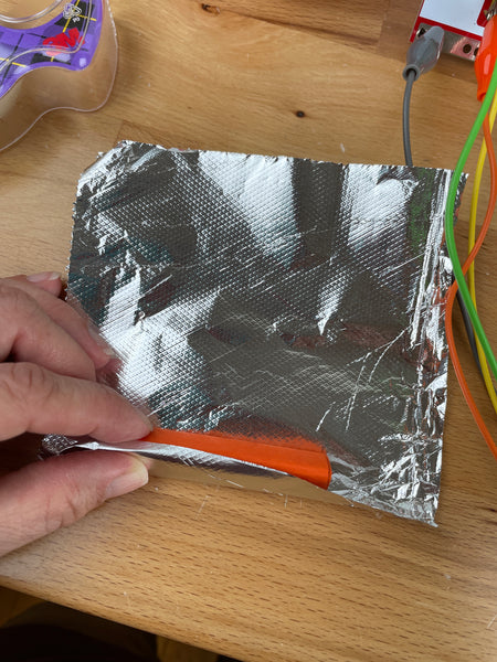 Roll cardstock in foil