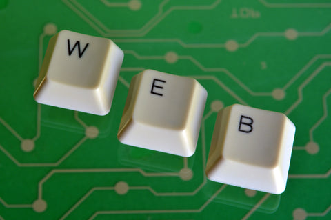 keyboard keys on a green circuit board