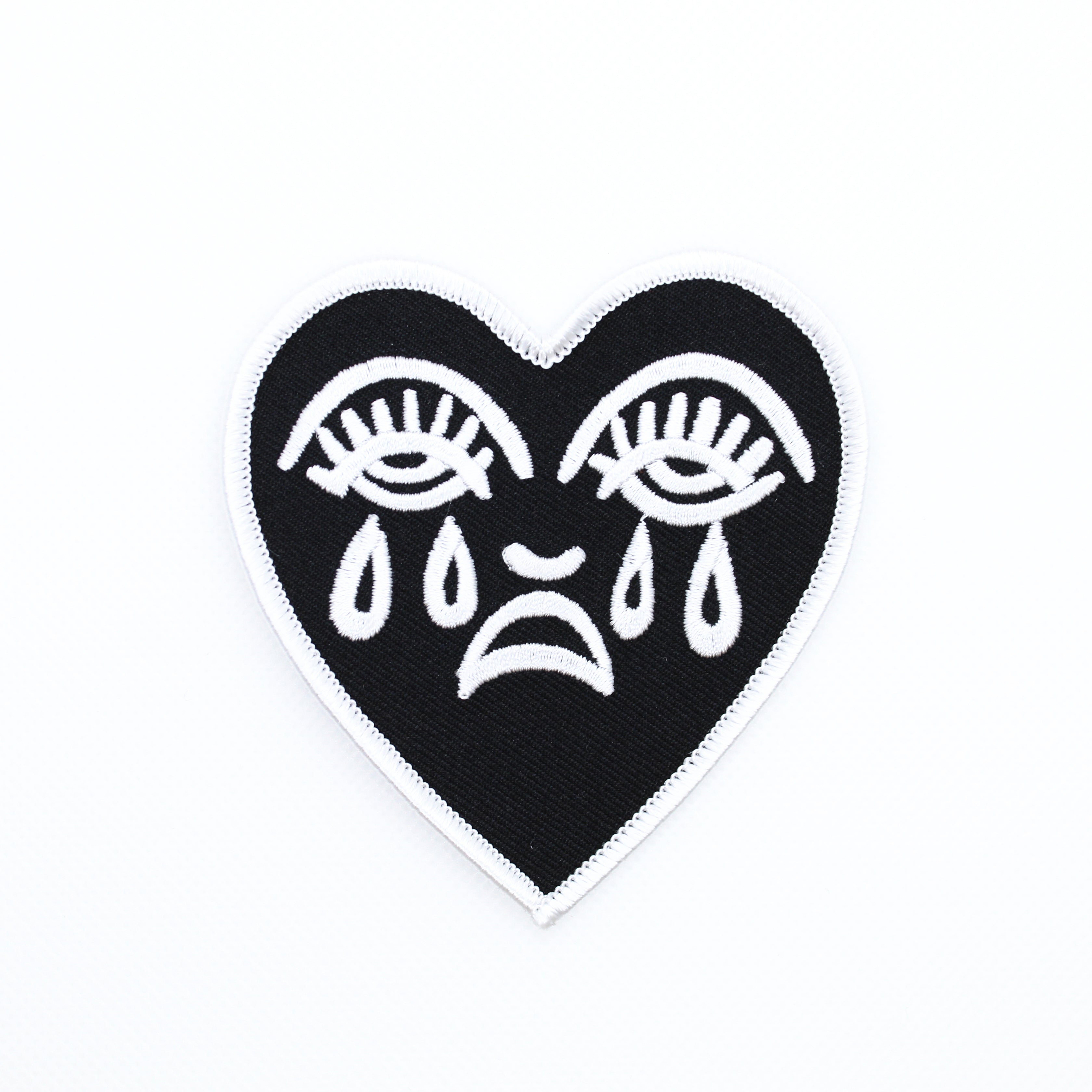 crying heart tattoo