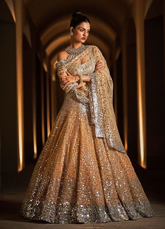 Alluring Rose Gold Tapeta Silk Mirror Work Lehenga Choli