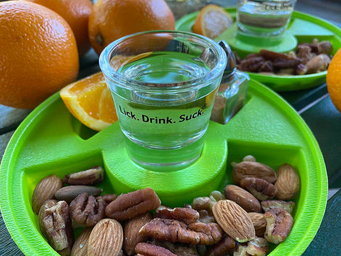 Serve oranges and cinnamon with tequila in Lick. Drink. Suck.® shot-of-tequila kits!