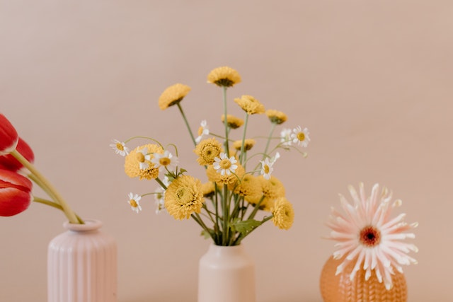 : Don’t forget to add some flowers to your home Alt text: Flowers in vases