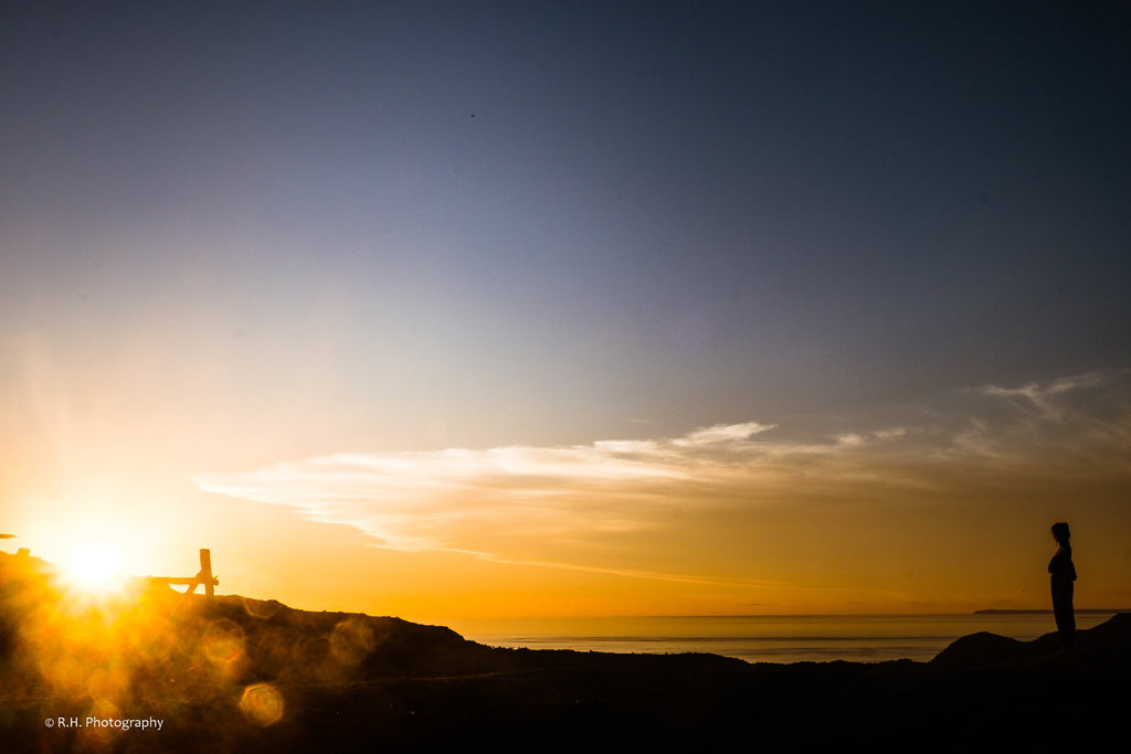 silhouette of woman on beach