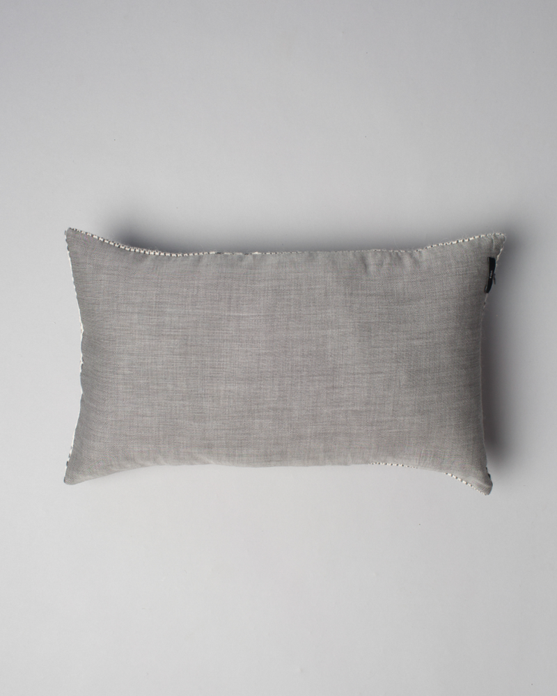 light gray lumbar pillow