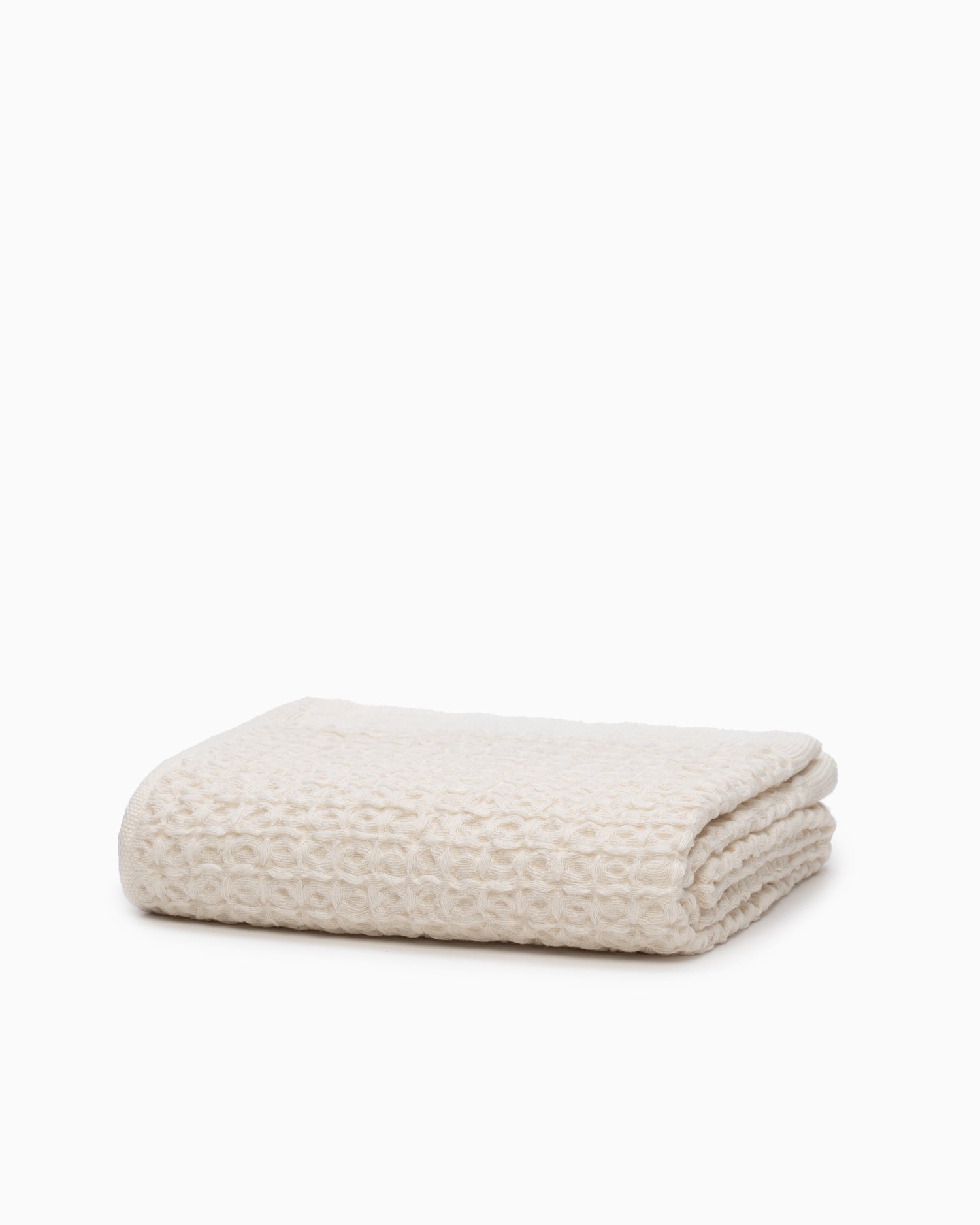 https://cdn.shopify.com/s/files/1/0163/9128/products/Lattice-Linen-Compact-Bath-Towel-Ivory-1.jpg?v=1649904672&width=1500