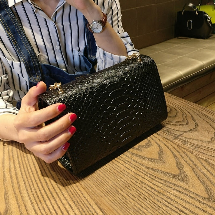 small black designer bag