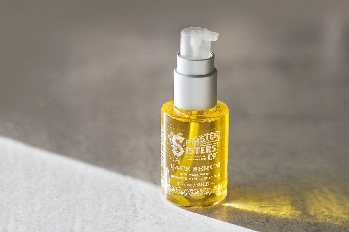 Bright yellow oil-based face serum with baobab and marula seed oils