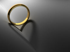 gold band with heart shadow