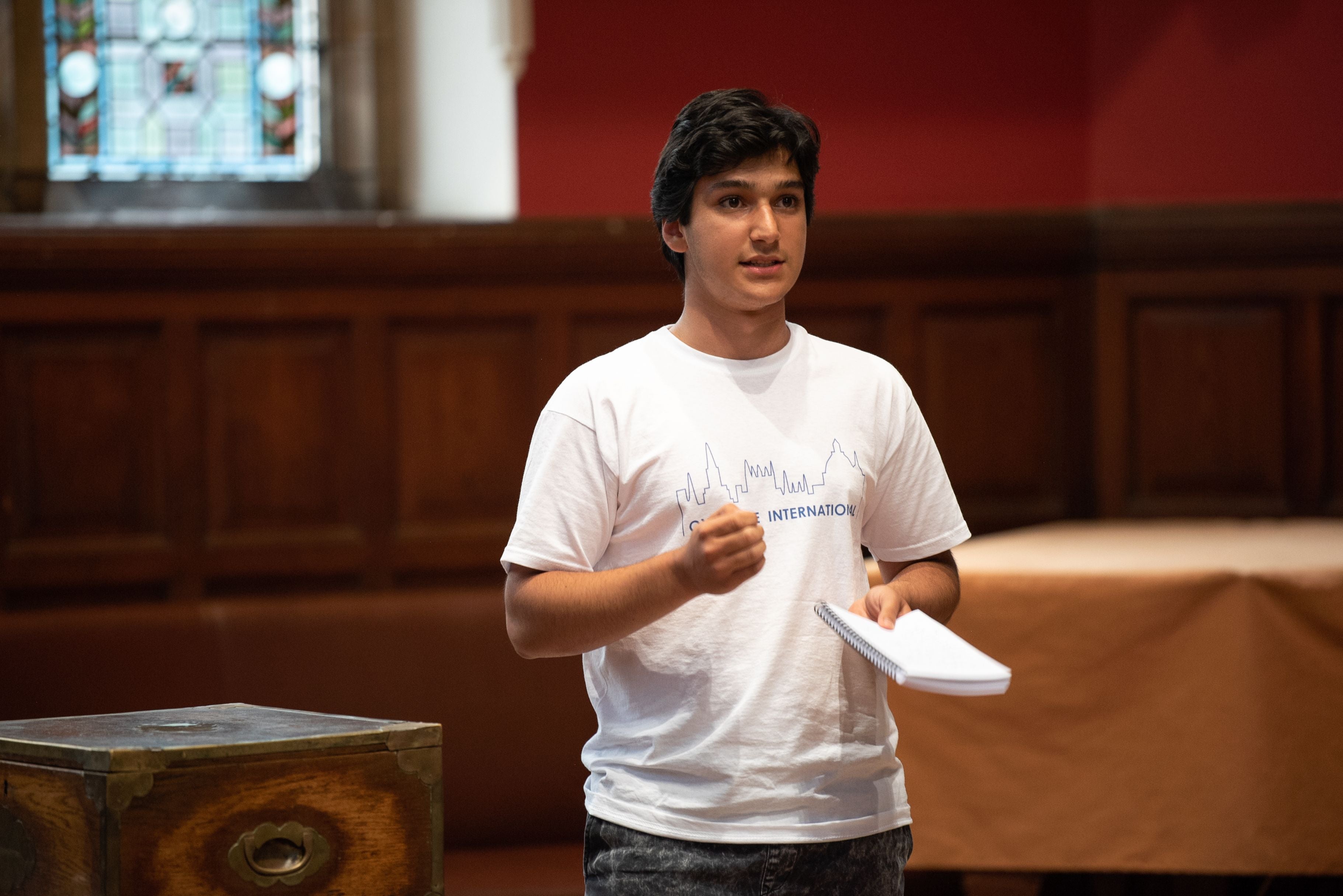 A summer school student debating at the Oxford Union
