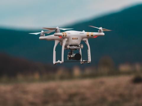 Drone flying in a field near Oxford