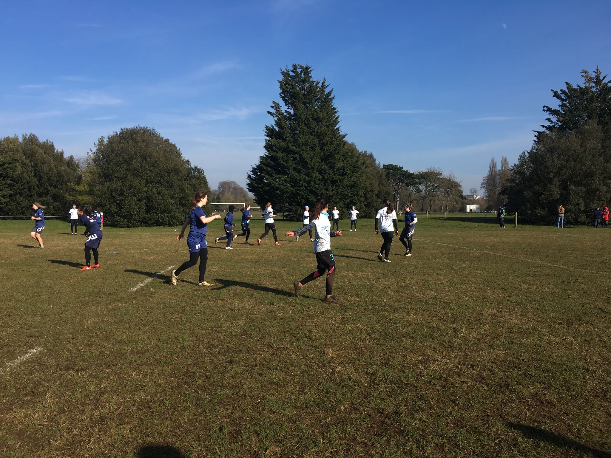 Cambridge University students playing sport and socializing
