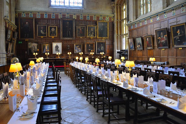 Oxford university formal dinner laid out in hall