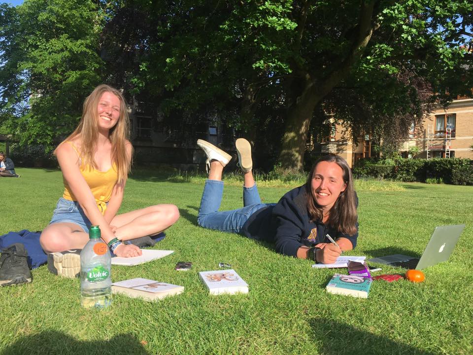 Oxford university students study in the summer sun