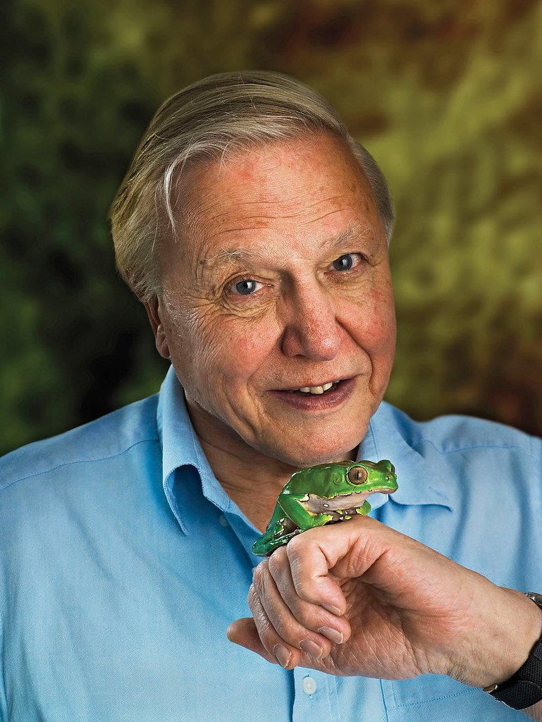 David Attenborough (an alumni of the University of Cambridge) with a frog