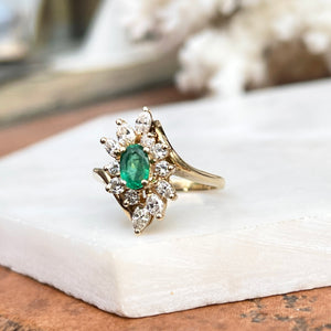 Estate 14KT Yellow Gold Oval .55 CT Emerald + Marquise Diamond Halo Ring