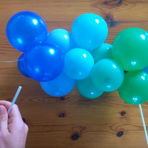 Attaching wire to balloon sticks for custom garland cake topper decoration