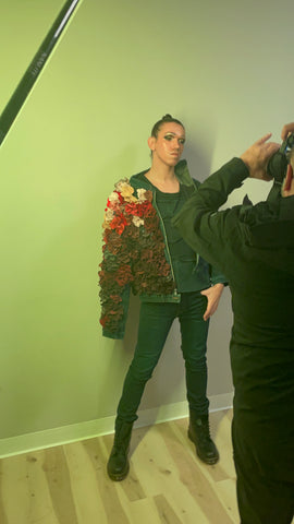  non-binary model wearing upcycled denim jacket by Stevie leigh