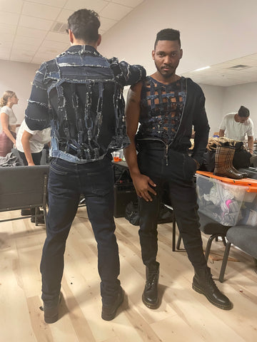 Two male models posing backstage at Stevie leigh fashion show