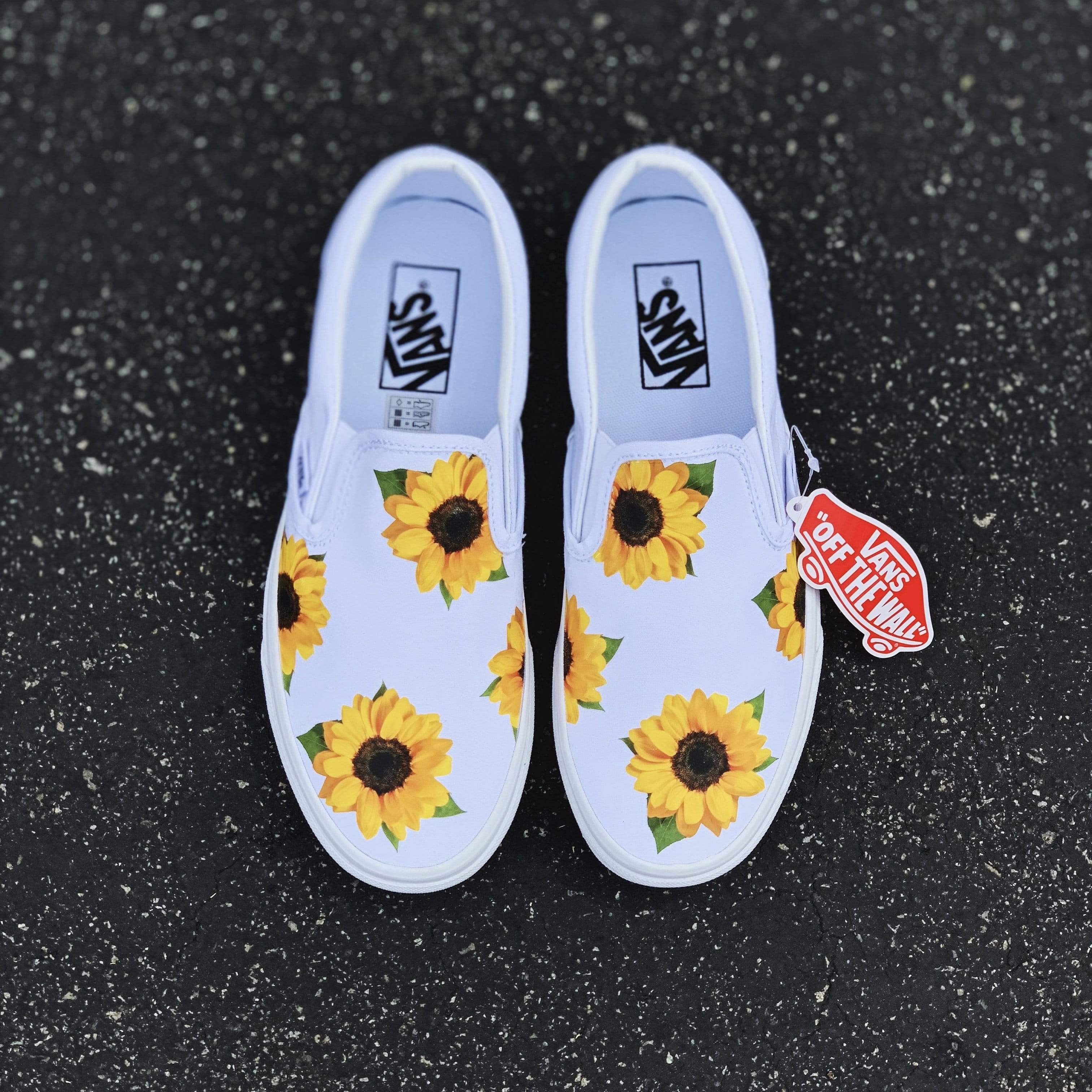 white sunflower nike slides