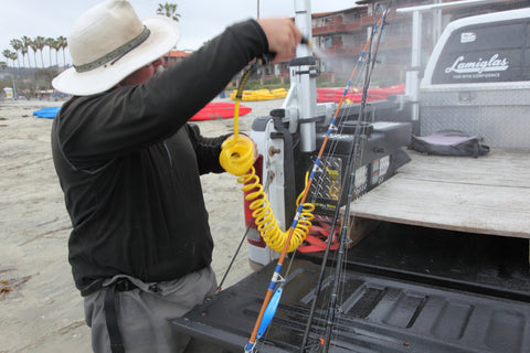 Rinsing off saltwater fishing poles with The Spray Box