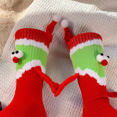 Unique and Funny Gift for Special Days:  Surprise your loved ones with a gift that stands out. The Baby Cute Hand in Hand Socks Magnetic Couple Anniversary Gift is not just an ordinary present; it's a unique and funny expression of love that turns any special day into a memorable celebration. Comfort and Warmth for Your Feet:  Beyond its symbolic design, these socks prioritize comfort. Crafted with care, they provide a cozy and warm embrace for your feet, ensuring that every step is taken in comfort and style. Hand in Hand with Magnetic Detail:  Experience the magic of the hand-in-hand design, complete with magnetic detailing. Just like the magnetic force that keeps the socks together, symbolize your eternal love by holding hands till the last breath. Let this detail be a daily reminder of your unbreakable bond.
