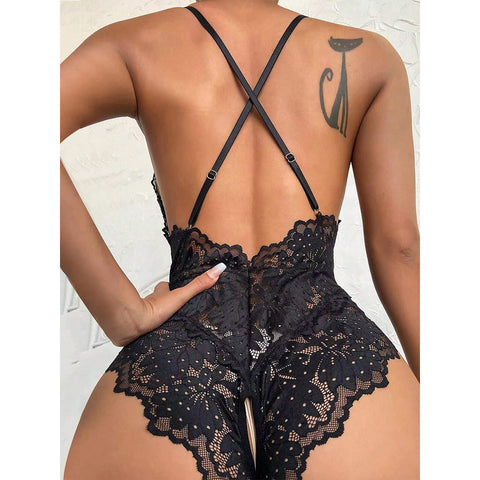 A sultry Women's One Piece Teddy Lingerie in black lace, featuring a seductive see-through mesh design that blends allure with comfort. The adjustable straps cater to petite frames, ensuring a flattering fit. Perfect for boudoir shoots or special occasions, this lingerie exudes confidence and sexiness. The stretchy fabric adds a touch of heat to enhance your allure. Get ready to make a statement with this captivating and empowering bodysuit.