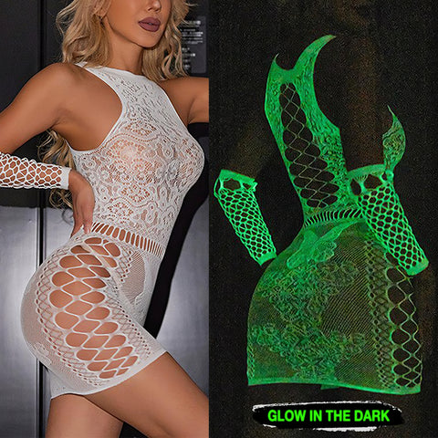 A close-up image of a woman wearing a Sexy Glowing Fishnet Bodysuit Tights. The fishnet tights are intricately woven and glow in the dark, adding a unique and alluring element to the lingerie. The bodysuit is form-fitting and accentuates the curves of the woman's body. She stands confidently, with her hands on her hips, and looks directly at the camera.