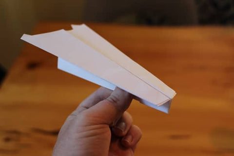 how to teach a child to make a paper airplane