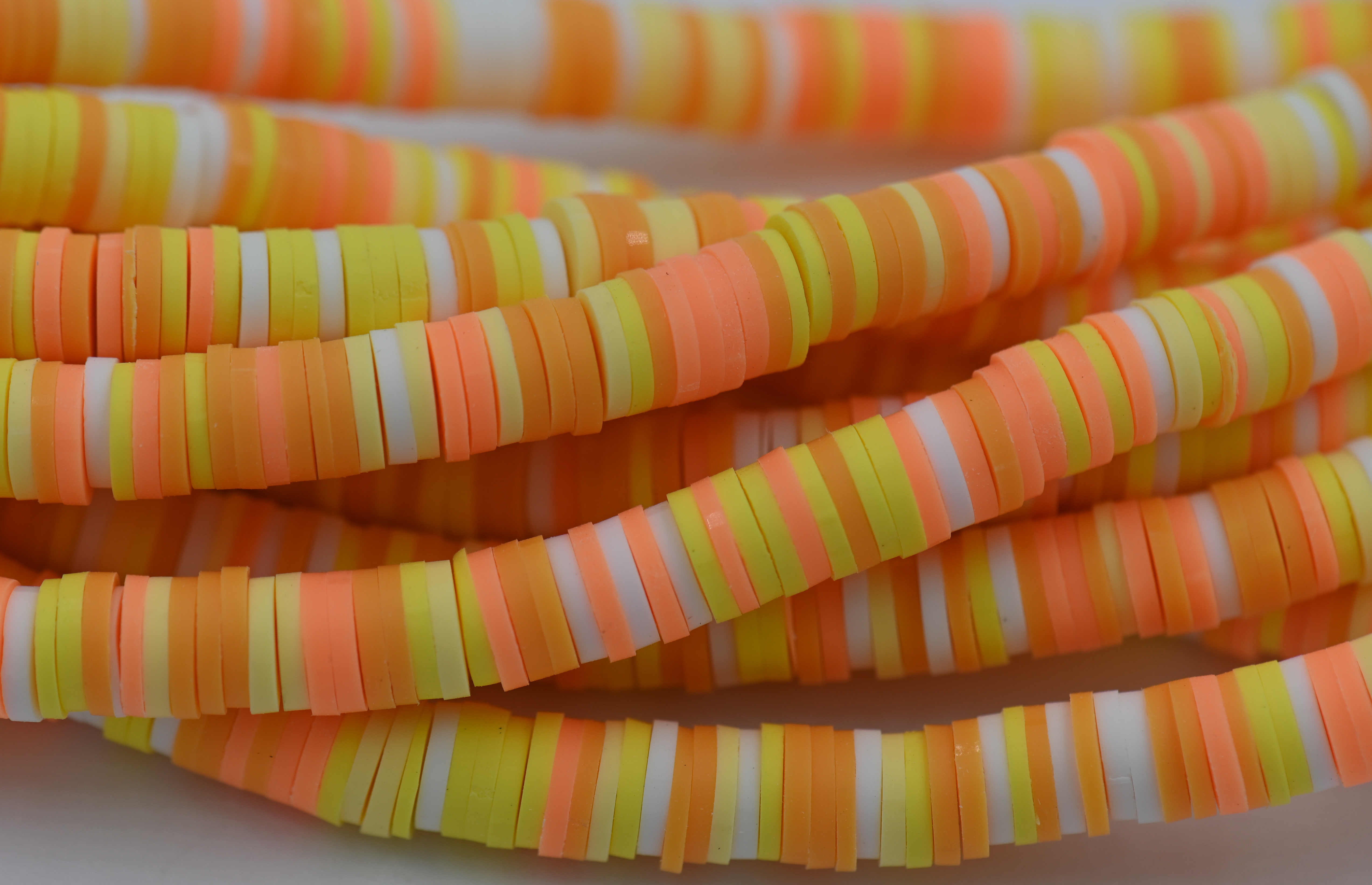 Flat Round Handmade Polymer Clay Bead Spacers Bright Yellow Orange Melon,  6x1mm, Magnolia Bead Company