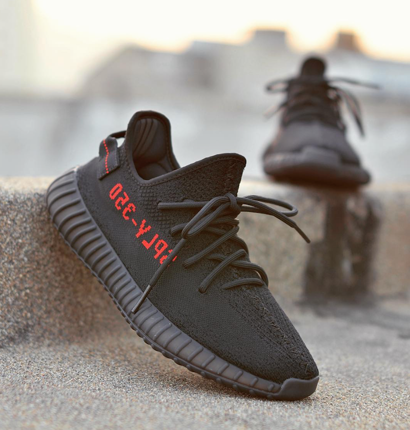 yeezy black with red writing